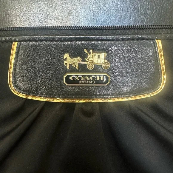 Coach Black Satin wristlet with horse & carriage logo. EUC - Picture 2 of 8